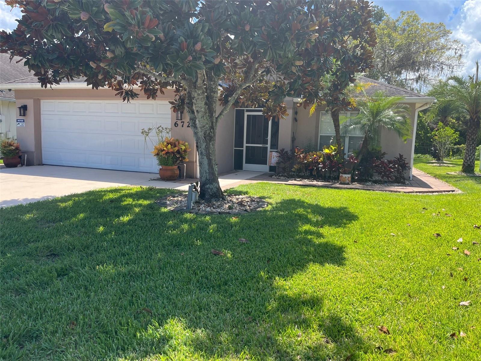 Lovely 3 bed/2 bath/2 car garage in the sought after Gated community of Coral Trace. The home backs up to the wooded preserve with a view of the pond. East access ti I-95 with community pool & club house & lawn service provided in your HOA feeds. This home must be seen to be appreciated.