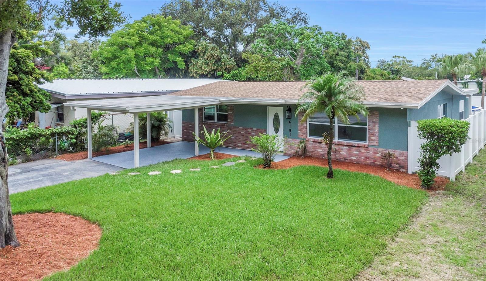 READY FOR FLORIDA? Welcome Home to this beautifully renovated, TOTAL-TURN-KEY 3-bedroom, 2-bathroom split-plan home, perfectly nestled in the highly sought-after Blvd Park community. Every detail of this stunning residence has been thoughtfully re-imagined with Quality, Craftsmanship, and Contemporary design in mind. Highlights include Luxurious FLOORING, Energy-Efficient LED lighting, fresh Interior/Exterior Paint, with Modern Fans, Fixtures, Trims, & Moldings throughout. Both bathrooms have been tastefully updated with Designer Tilework, Modern Vanities, and Contemporary Fixtures that blend comfort with style. Retreat to the master suite, which boasts a spacious Walk-in Closet, a fully remodeled en-suite Bath, and plenty of space for a King-sized bed & Furniture set. At the heart of the home lies a Gourmet Kitchen designed to impress-featuring Real Wood Cabinetry, GRANITE Countertops, and premium Stainless Appliances. It's a true chef’s dream and an entertainer’s delight. The Expansive Open-Concept layout is flooded with Natural Light, creating a warm and inviting atmosphere ideal for both everyday living and hosting guests. Step outside to the Poolside Porch, which is Custom-Designed for entertaining. Recent upgrades include stylish Epoxy Flooring and a FULL-Service Outdoor Kitchenette, equipped GRANITE Countertops and Stainless Appliances, perfect for al fresco dining and memorable Family gatherings. Site features include Covered Parking, New POOL equipment, New Landscaping, New Irrigation system, 6’ Vinyl Fence, with Double-Gate ALLEY Access, providing easy storage for boats, RVs, trailers, & more. This property is located in Zone X (aka non-Flood Zone) providing peace of mind while saving you Thousands in annual Insurance premiums. Don’t miss this exceptional opportunity on this this fully renovated, high quality home.