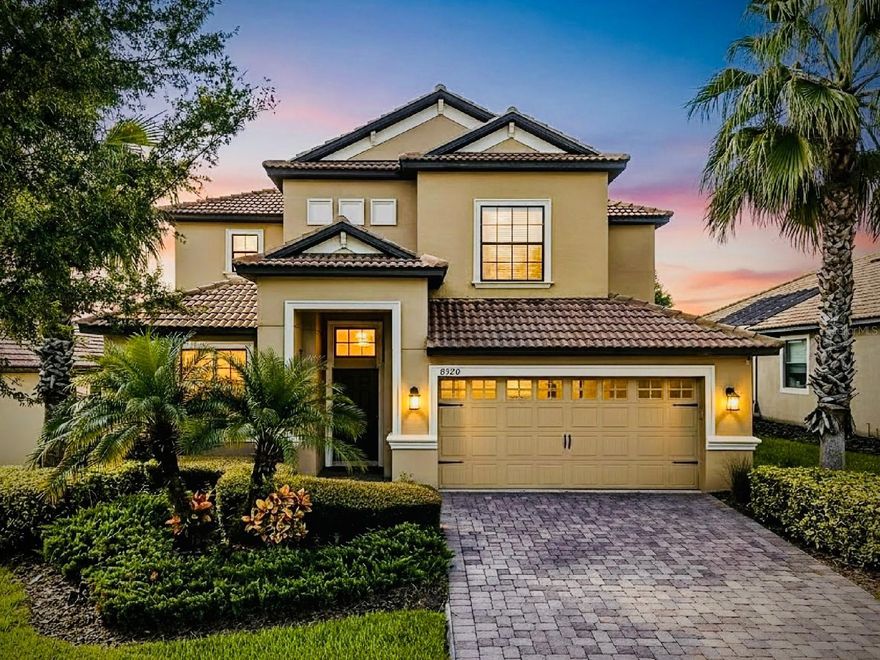 Welcome to 8920 Dove Valley Way, a spacious five-bedroom residence with GOLF COURSE VIEWS and a PRIVATE POOL, beautifully situated in private residential ChampionsGate Country Club—where no short-term rentals are allowed. This home combines refreshed interiors with the comforts of true Country Club living.  As you enter, a formal sitting area and large dining room set the stage for entertaining, leading to an open-concept kitchen and family room overlooking the 17th fairway of ChampionsGate Country Club.. The well-equipped kitchen features granite countertops, NEW stainless steel appliances, and a generous island ideal for casual dining or hosting. Large sliding glass doors connect the main living area to the screened lanai, showcasing a sparkling pool with waterfall features, tropical landscaping, and expansive golf course vistas—a perfect backdrop for relaxing or entertaining guests. The first floor also includes a guest bedroom and full bath, providing flexibility for visiting family or a private home office. Upstairs, a spacious loft creates a natural second living space, ideal as an office or play area. The primary suite offers a serene retreat, complete with a spa-style bath, dual vanities, and an oversized walk-in closet. Three additional bedrooms (four total upstairs) plus a large media/game room, currently outfitted as a home theater, ensure plenty of room for family, guests, or hobbies. Your HOA dues include full golf membership, internet, cable TV, landscape maintenance, and access to all ChampionsGate resort amenities.  These include: The Oasis Club with lazy river, pools, hot tubs, tiki bar, restaurant, and fitness center, the private Plaza Club exclusive to Country Club residents, the Retreat Club water park, multiple neighborhood pools, tennis and pickleball courts, a dog park, and planned activities, guard-gated security, lawn maintenance, high-speed internet, and cable/streaming services. Located minutes from Disney, I-4, shopping, dining, and medical services, this home delivers the space, sophistication, and lifestyle today’s buyers seek. Discover a rare combination of golf-front privacy and resort living where every day feels like vacation—and you can truly,  Live Like a Champion!