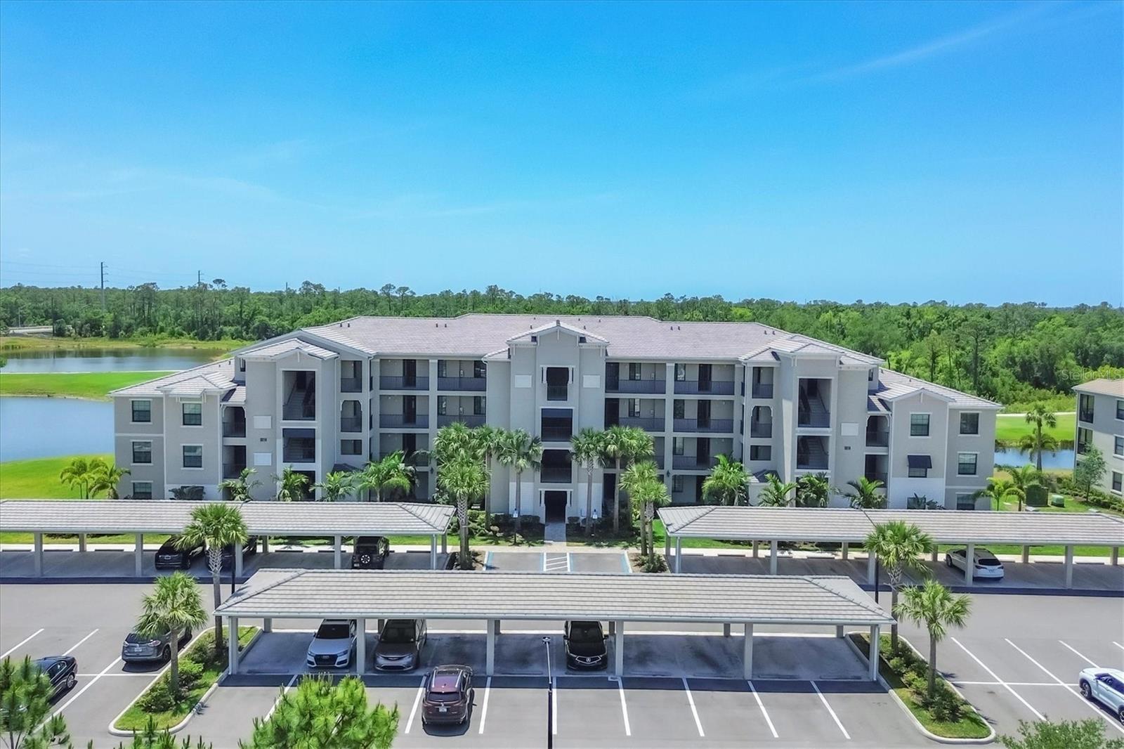 Welcome to Your Fully Furnished Dream Retreat in Lakewood National! Experience resort-style living at its finest in this beautifully appointed 2-bedroom, 2-bath condo located on the 4th floor with breathtaking views of the Lakewood National Golf Course. This is more than just a home—it's a lifestyle. Step inside and be welcomed by an open-concept layout that seamlessly blends comfort and sophistication. Large windows frame picturesque views of the golf course and lake, flooding the space with natural light and offering a stunning backdrop for everyday living. The kitchen is a chef’s dream, featuring stone countertops, a spacious island with breakfast bar seating, and stainless-steel appliances—perfect for entertaining or enjoying a quiet morning coffee. The primary suite offers a peaceful retreat, complete with a king-size bed, dual walk-in closets, and a spa-inspired en-suite bathroom designed for total relaxation. The guest bedroom, furnished with a queen-size bed and easy access to the second bathroom, doubles beautifully as a home office or welcoming space for visitors. Whether you're planning a seasonal escape or an extended stay, this condo provides the perfect balance of luxury and convenience in one of Florida’s most sought-after communities. Unmatched Resort-Style Amenities Include: Two championship 18-hole golf courses, Resort-style pool with full-service tiki bar, Full-service spa, 8 clay tennis courts and 4 pickleball courts, State-of-the-art fitness center, 2 bocce ball courts, Full-time lifestyle director, newly opened Grand Clubhouse. Located just minutes from the Gulf Coast's pristine beaches, upscale shopping, dining, and easy access to I-75, this property puts you at the heart of it all. Life here is more than beautiful—it’s effortless. Monthly rentals less than 6 months include utilities and will have a 13% sales tax charged. Membership Transfer for only $642.00! Monthly Rate (December - April): $5,500.00 Don’t miss your chance to live the Florida lifestyle you’ve been dreaming of!