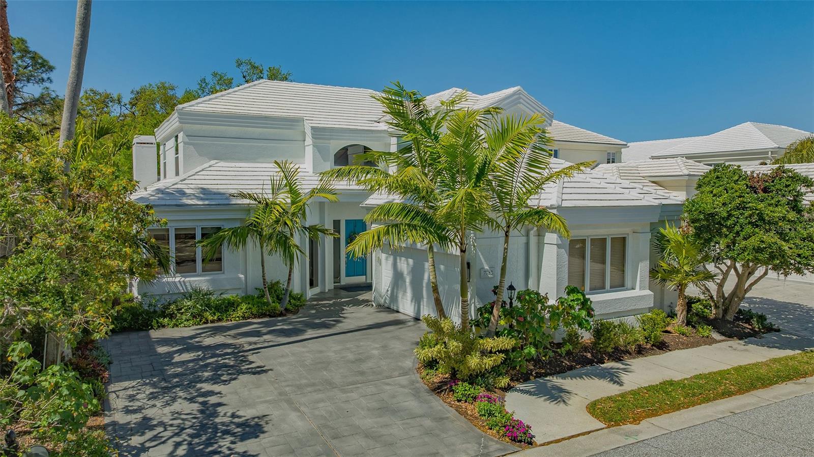 Welcome to this exquisitely renovated maintenance-free home in Prestancia-a gated and guarded Golf Course community. Enjoy the serenity of the golf course and pond views! The cul-de-sac location offers privacy and a quiet setting. This home offers 3,643sf of living space. 3 spacious bedrooms, 3.5 baths, walk-in closets, loft, storage space galore. The large loft can be a flex room. The renovated custom kitchen offers a large island, KITCHEN AID stainless steel appliances, double ovens, wood cabinets, quartz counter tops, marble backsplash, eat-in space plus breakfast bar, Reverse Osmosis system. ***Water softener system for the entire home*** All bathrooms have been upgraded to feature quartz counters, beautiful tile flooring, backsplash, large walk-in shower and separate tub in the master bath. Laundry room with new SAMSUNG appliances, new cabinetry. MOTORIZED HURRICANE SHUTTERS. The wrap-around screened-in lanai features a jacuzzi, outdoor kitchen and shower and sitting area to enjoy the beautiful sunsets.
New lighting throughout, new fans, new spa heater, NEW AC SYSTEM, NEW OUTDOOR KITCHEN, WATER HEATER 2020, new landscaping and much more.
The Enclave community lap pool just a few steps away will delight you! Walk or ride your gold cart to the Club. TPC membership is optional. Park like setting with miles of sidewalks. UNBEATABLE LOCATION, minutes from LEGACY TRAIL, Palmer Ranch shopping to include COSTCO, PUBLIX, TARGET, SPROUTS, GULF GATE RESTAURANTS, 10 minutes to SIESTA KEY BEACH, 15 minutes To NOKOMIS AND VENICE BEACHES, 15 minutes to DOWNTOWN SARASOTA.***SELLER MOTIVATED***BRING OFFERS***