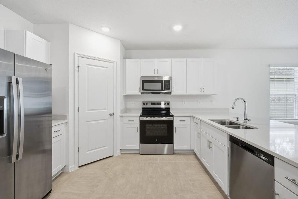 Photo of 13584 Tropical Breeze Way, Hudson, FL 34669 (MLS # TB8396160)