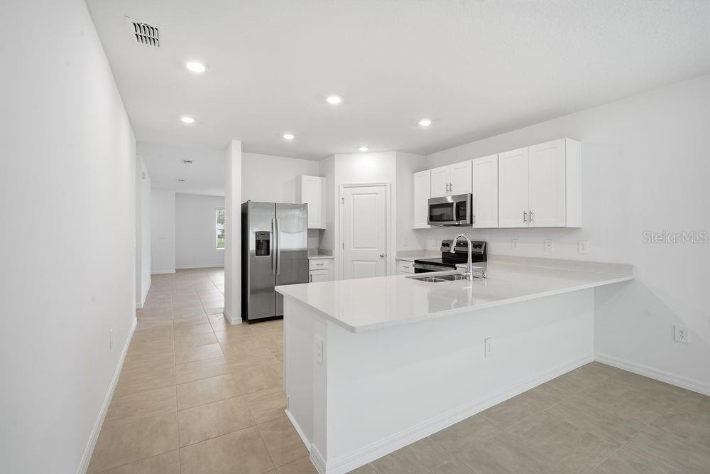 13584 TROPICAL BREEZE WAY