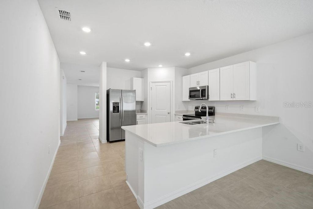 Photo of 13584 Tropical Breeze Way, Hudson, FL 34669 (MLS # TB8396160)