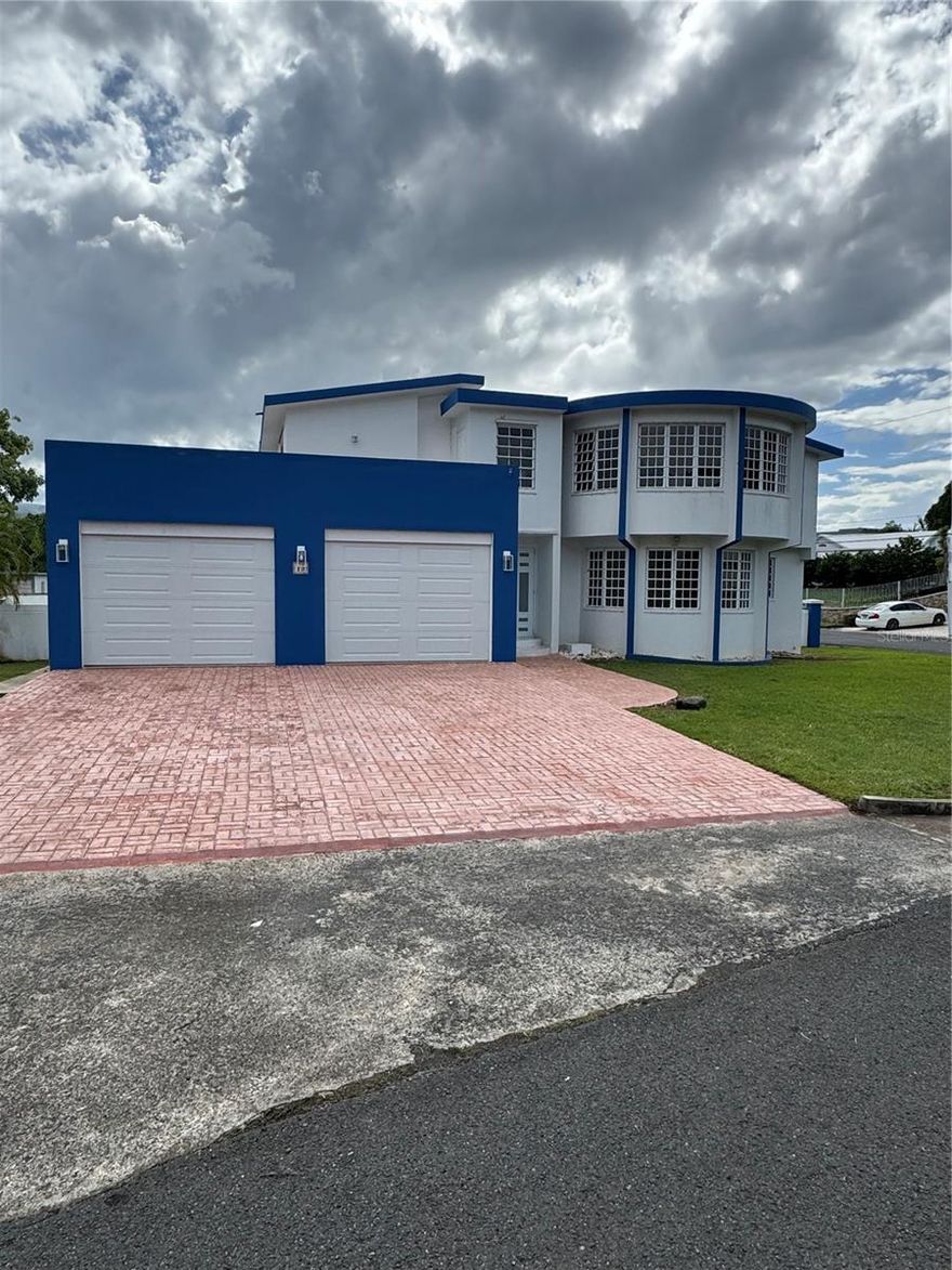 Beautiful residence located in the Hacienda Las Garzas  community within the Coco Beach area of Rio Grande, just minutes from the luxurious Hyatt Regency Reserve. This property has a perfect blend of spacious  design  privacy, and spectacular views of El Yunque Rainforest, surrounded by lush tropical scenery and  and refreshing coastal breezes. The home features 4 bedrooms, 2 1/2 bathrooms  and open concept living areas ideal for family  gatherings and entertainment. A large second floor terrace provides breathtaking  panoramic views  of the mountains perfect for relaxing or enjoying sunset  evenings. The backyard is  spacious offering great potencial  for a pool, gazebo or outdoor recreation area. The property also includes three garages with total parking 4 vehicles. Located in one of Puerto Rico's most desirable east coast communities close to de beaches , golf course and with easy access to PR 66