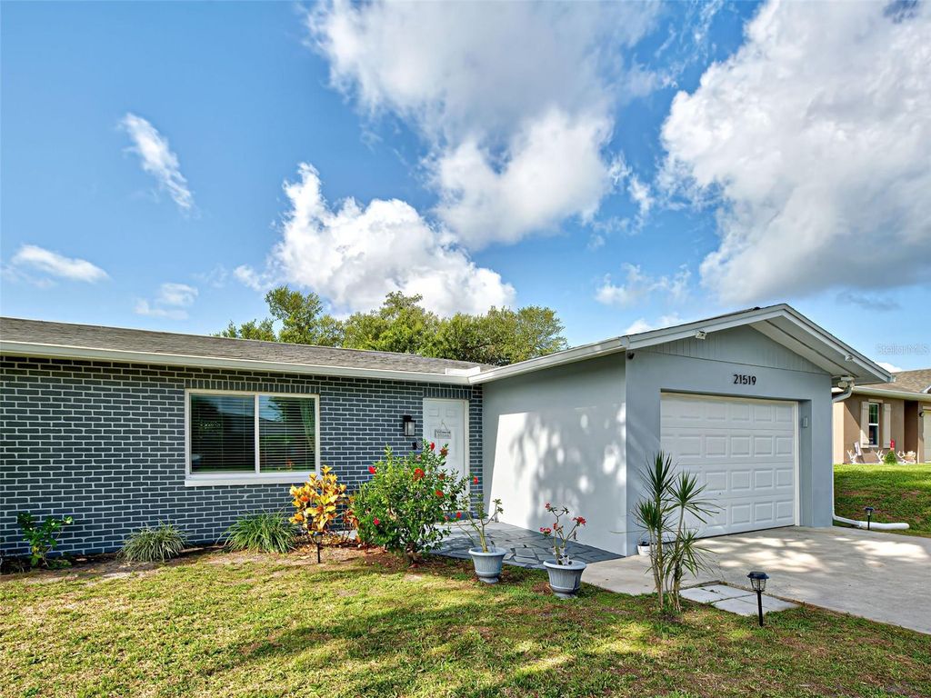 Photo of 21519 Fairway Ave, Port Charlotte, FL 33952 (MLS # D6142677)