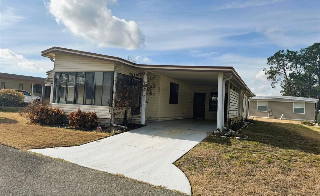 Photo of 133 Hibiscus Way, Leesburg, FL 34748 (MLS # R4910716)