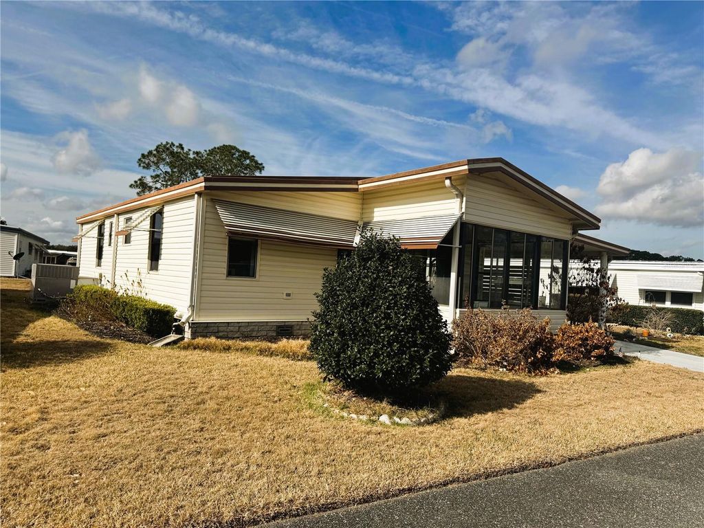 Photo of 133 Hibiscus Way, Leesburg, FL 34748 (MLS # R4910716)