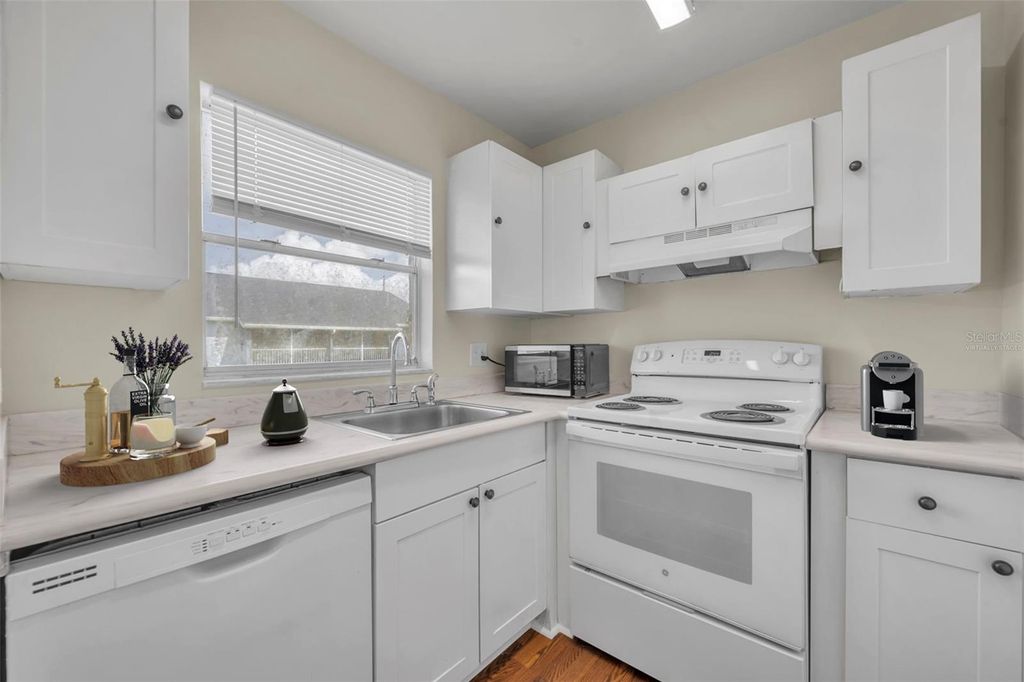 Photo of 4124 Pershing Pointe Place #4, Orlando, FL 32822 (MLS # O6387987)