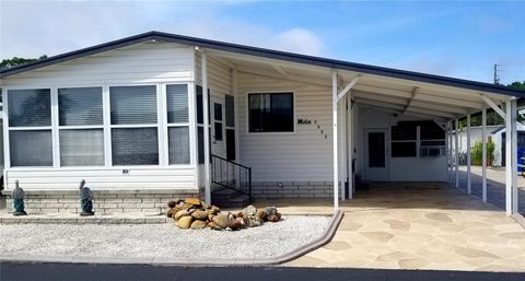 Photo of 3611 Tiki Drive, Holiday, FL 34691 (MLS # TB8368956)