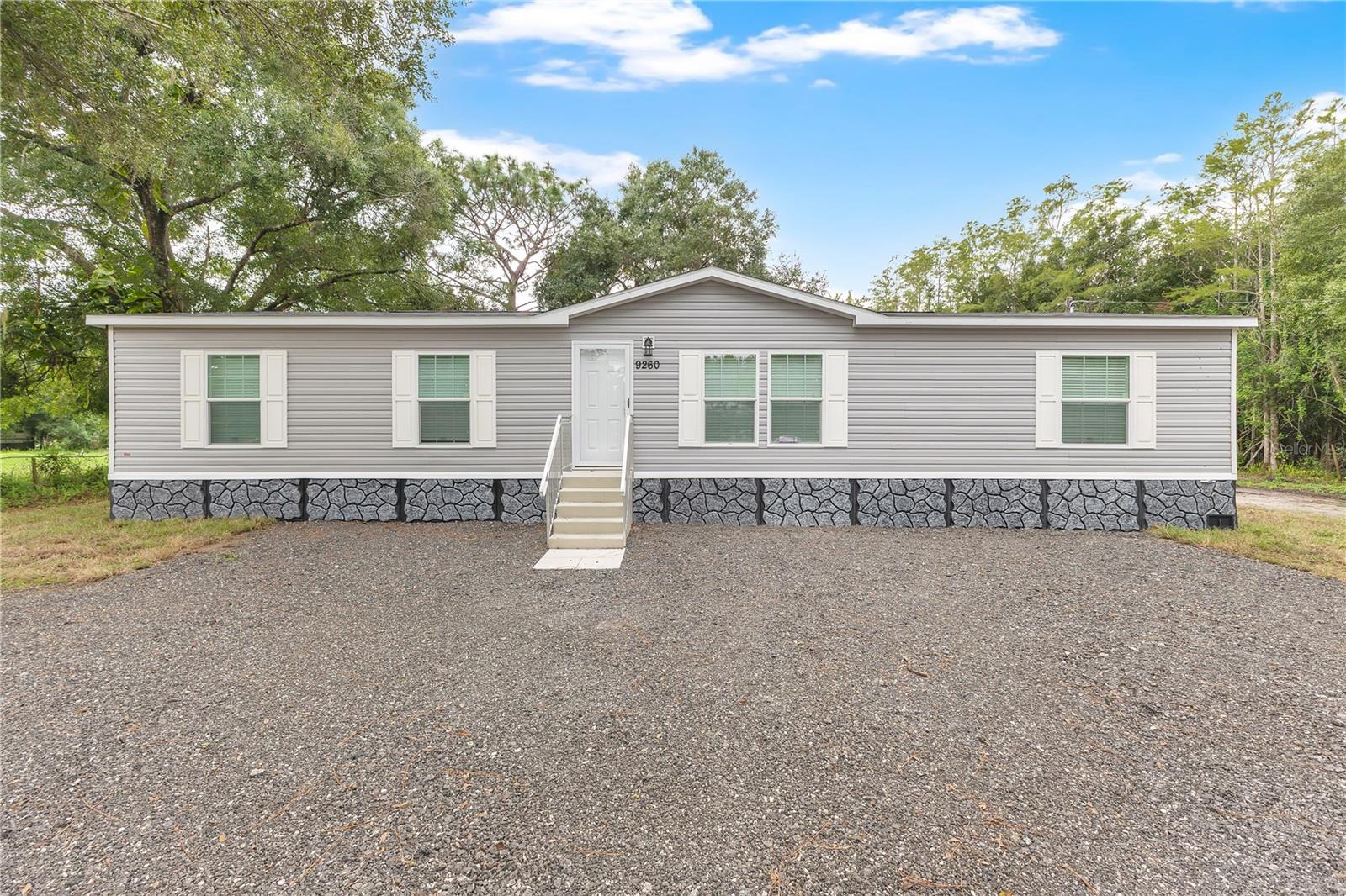 This beautifully maintained 4-bedroom, 2-bathroom home offers the perfect blend of comfort, style, and convenience. Step inside to a bright open layout, where the living room, dining room, and kitchen flow seamlessly together—ideal for both everyday living and entertaining. The kitchen is designed with function in mind, featuring ample cabinetry, a center island, and plenty of workspace for preparing meals. Natural light fills every corner, creating a warm and inviting atmosphere. The master suite is a true retreat with its own private bath, complete with a dual vanity and a spacious step-in shower. Additional bedrooms provide flexibility for family, guests, or a home office. Outside, enjoy a spacious yard—perfect for relaxing, gardening, or hosting gatherings. With scenic views and a location within walking distance to local parks and amenities, this home combines lifestyle and convenience in one move-in ready package.