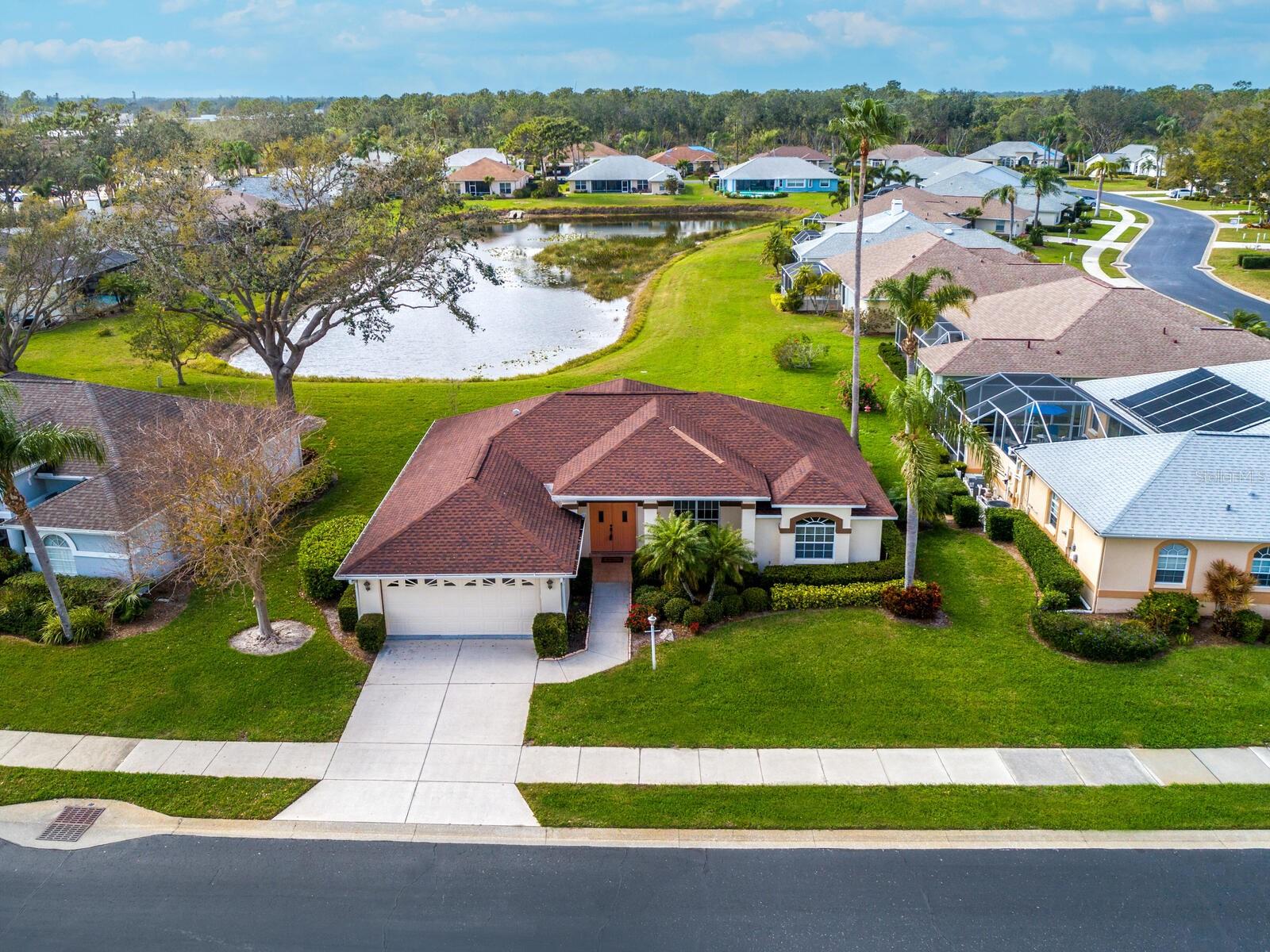 Under contract-accepting backup offers. Welcome to The Isles of Chestnut Creek! Friendly and highly sought-after, this community features a heated swimming pool, tennis courts, shuffleboard, club house, and many social events available to you, if you wish to enjoy. Arriving at this home, you’ll notice the spacious front porch and double door entry, showcasing the grand lake view as you enter the foyer. This 3 bedroom, 2 bath single family maintenance free home boasts grand sunsets over the sparkling lake! This home is furnished for your convenience. The kitchen features quartz countertops, breakfast bar and a dinette overlooking the lanai and lake. The home features an open floorplan, cathedral ceilings, New roof in 2016, New A/C in 2020, New water heater in 2022. The lanai has indoor/outdoor carpet and provides plenty of space to sit and enjoy the sunsets, a good book, or conversations with friends. Basic cable and ground maintenance are included in the fees. Inside laundry/utility room. Not in a flood zone. Conveniently located near Venice Island and nearby beaches, shopping, Venice & Sarasota Arts, and access to I75. Come see this home and make it yours!