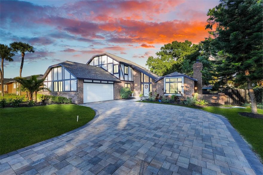 Not your cookie-cutter home.  This lovely tudor offers character, charm, pool, privacy, & perks. 

Welcome home to your private retreat in one of Central Florida’s most desirable golf communities! Live where luxury meets lifestyle in this immaculate 4-bedroom, 2.5 bath retreat nestled in one of Central Florida's premier golf communities.  Just minutes from Universal Studios, Disney, Restuarant Row, the international airport, and downtown Orlando, this home delivers the perfecgt blend of tanquility and convenience.

Step inside and fall in love with the porcelain tile floors, black granite sparkling countertops, and freshly painted interiors that make the home feel light, bright, and modern. The spacious open floor plan flows beautifully for entertaining or relaxing by your wood-burning fireplace on cozy evenings.

Out back, enjoy true privacy with a lush, peaceful yard and an extra-large swimming pool perfect for laps, plus a hot tub to unwind after a long day. Every detail has been cared for — from the new roof and driveway with sienna rio pavers to the newer hurricane-proof windows for safety and peace of mind.

You’ll love being part of this vibrant community with Social Club access for just $58 a month, plus a $75 quarterly food minimum (optional) — meaning you can stroll to the clubhouse for dinner instead of cooking on weekends. or weekdays. Prefer golf? You can easily join the club and enjoy endless fairway views right in your own neighborhood.  This home is more than a place to live -it's a lifestyle upgrade..  Whether you're entertaining, relaxing, or teeing off, this property checks every box. You'll often see people riding bikes, jogging, and getting their fitness in within this private 'Central Park' of Orlando.

Schedule your private tour today and start living the Florida dream!

Roof (2019), Hot water heater (2025), Windows (2024), Driveway (2025), Hot-tub (2024), Painting (2025), Pool pump (2022), A/C new motor (2024) and new UV light (2025), Irrigation (2025)