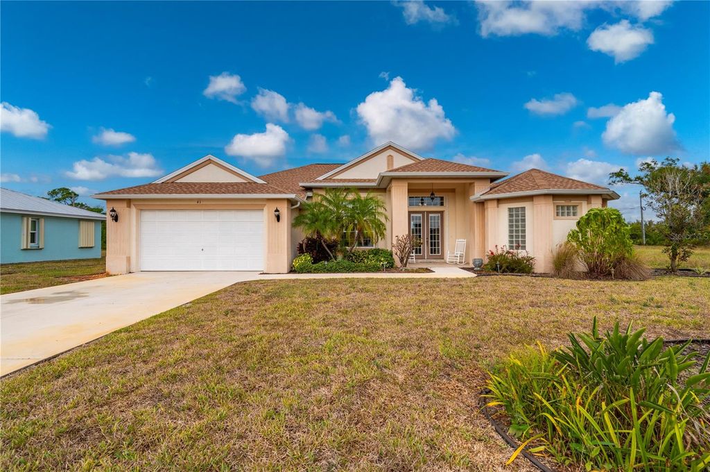 Photo of 411 Boundary Boulevard, Rotonda West, FL 33947 (MLS # C7518704)