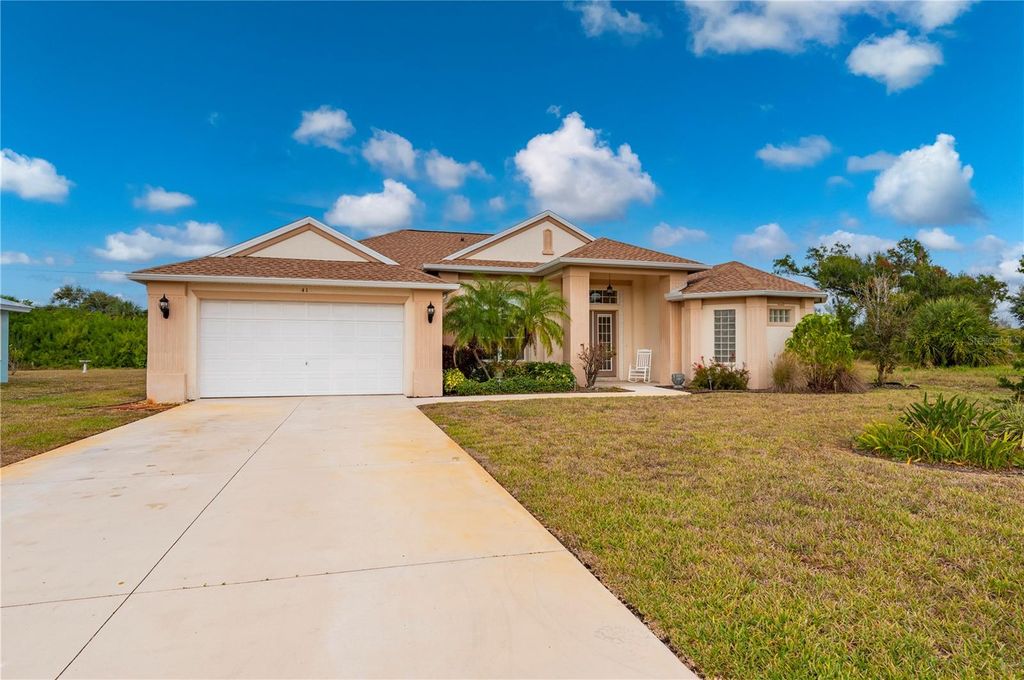 Photo of 411 Boundary Boulevard, Rotonda West, FL 33947 (MLS # C7518704)