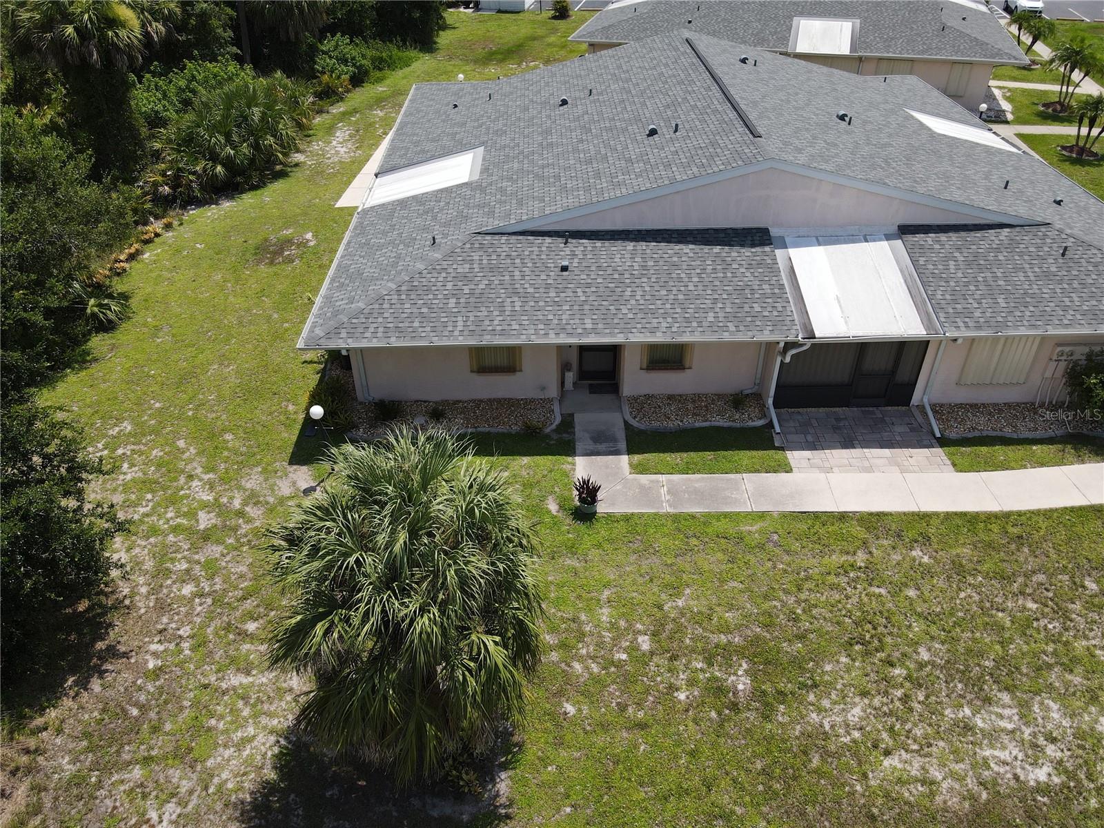 Welcome to Punta Gorda and Sharamere Woods Condo Association. This super cute condo is so affordable that it will allow you to enjoy all the other fun things in life. Priced at only $99,900 plus coming partially furnished, this is priced to sell. The association has a screened in large pool area as well where the members meet for get togethers and laughs. All the roofs were replaced new in 2023 and there is not any current assessments either. Lawn maintenance is included in your HOA fees so all you have to do is take care of your own shrubs and flower beds. This unit has paid extra for the large river rock that is already installed as well. The unit is a 2 bedroom with 2 full bath with a spacious lanai that has access from the primary bedroom, the living room and the outside. With 4 buildings that make up this condo association, this unit has the best location of all of them as it has the ultimate in privacy and wildlife as you can see by the overhead pictures. The location of this home is just a couple minutes from I-75 and just minutes from downtown Punta Gorda and the amazing restaurants, pubs and sports bars. So many different types of cuisines to choose from that you can eat at a different type of restaurant every night of the week. The new Sunseeker is just down the road and the convenience with 2 Publix Shopping Centers within minutes of the home. 2 Home Depots and a Lowes within 15 minutes as well. Downtown has so many iconic places to visit with all the historical sites. You can sit out on the point of the harbor, walk the miles long walking and biking path, stop by the playground on the water and take up the fastest growing sport, Pickleball!! The newer Pickleplex is now done and they have league play and tournaments for that competitive spirit. Lots of golf courses all around for all of you golfing enthusiast and plenty of places to put a boat or waverrunner in the water. The pool is just waiting for you to come and work on your tan while getting some needed exercise as well. So take the time to schedule your showing at this 55 and over community and get ready for that next stage in your life. No pets except for service pets are allowed in this association.