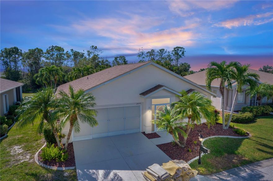 One or more photo(s) has been virtually staged. HUGE PRICE REDUCTION making this home an INCREDIBLE VALUE.  AWESOME Sheffield floor plan FEATURING EXTENDED and enclosed Lanai plus LARGE PAVER PATIO in the gated golf course/active resort of Kings Gate, a 55+ community.  This house provides an abundance of natural light to go along with the extended lanai and large paver patio that offers a view of the 3rd hole and nature.