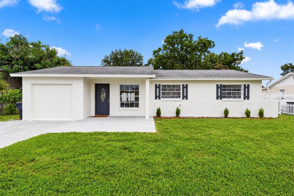 Photo of 1719 Julian Lane Drive, Tampa, FL 33619 (MLS # TB8553120)