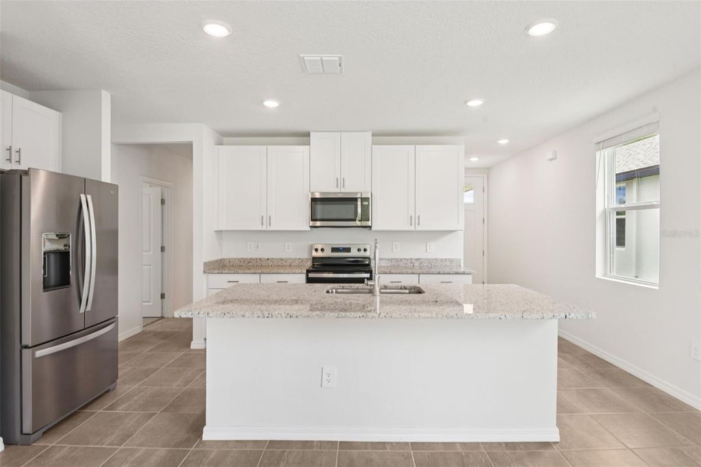 Photo of 1847 Brekey Way, Zephyrhills, FL 33541 (MLS # O6311448)