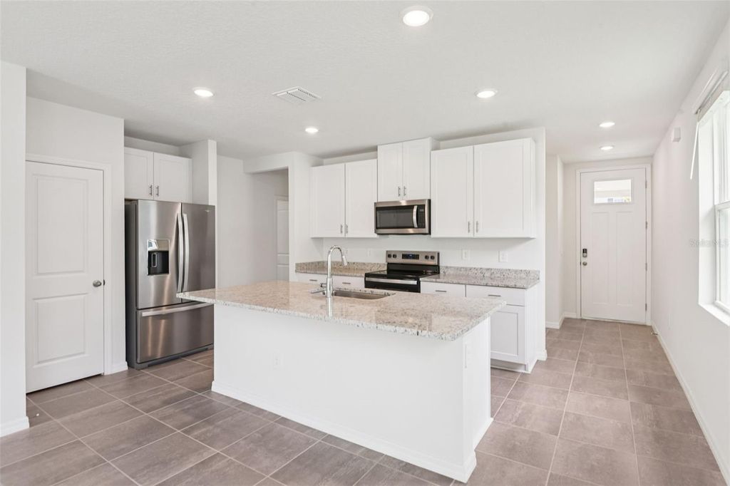 Photo of 1847 Brekey Way, Zephyrhills, FL 33541 (MLS # O6311448)