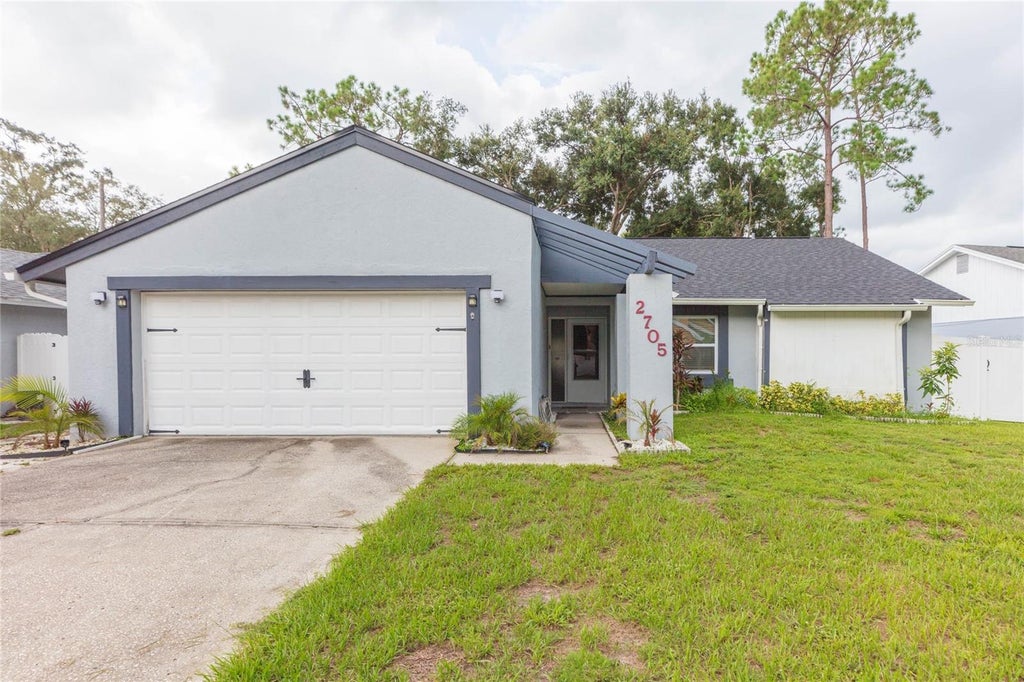 Photo of 2705 Lakeville Drive, Tampa, FL 33618 (MLS # TB8535469)