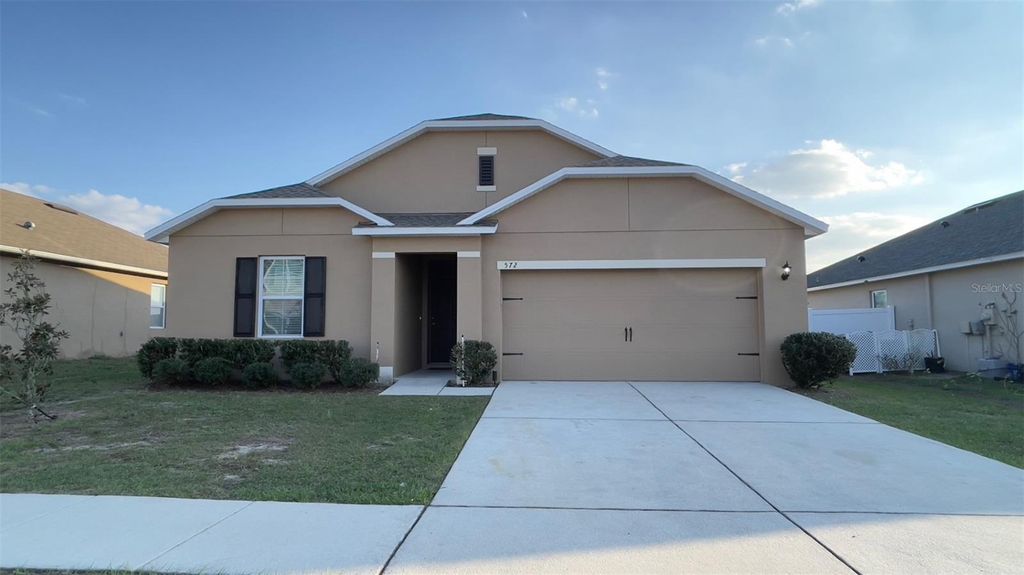 Photo of 572 Nova Drive, Davenport, FL 33837 (MLS # O6388715)