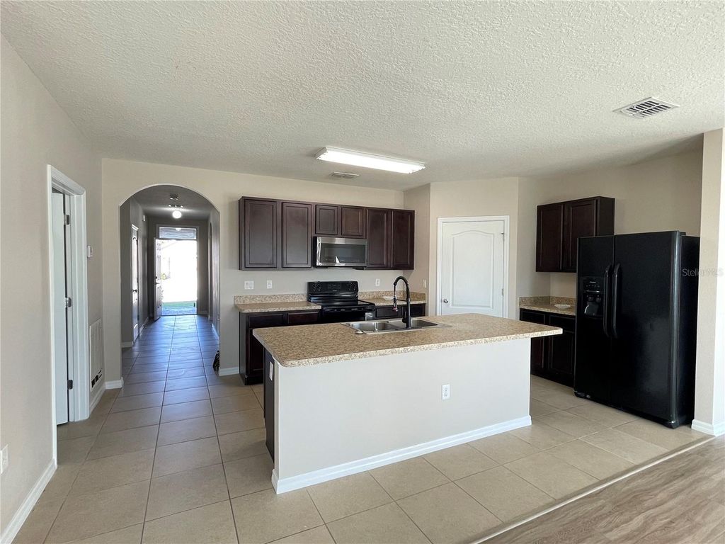 Photo of 572 Nova Drive, Davenport, FL 33837 (MLS # O6388715)