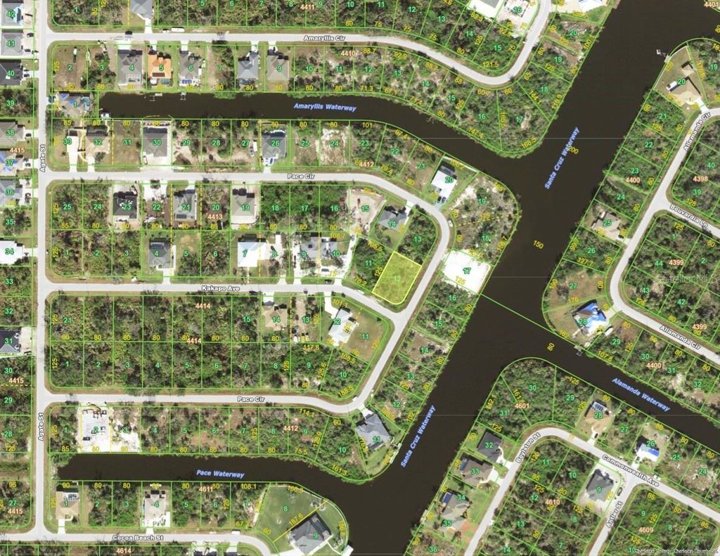 Photo of 13236 Kakapo Avenue, Port Charlotte, FL 33981 (MLS # O6338594)