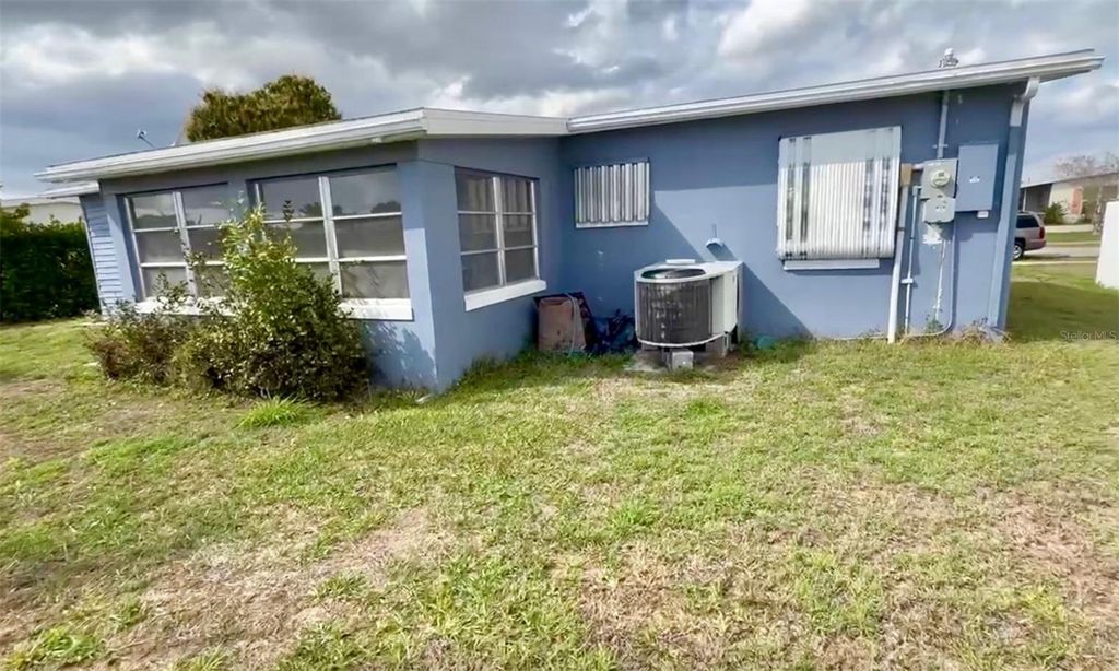 Photo of 21435 Glendale Ave, Port Charlotte, FL 33952 (MLS # C7523777)