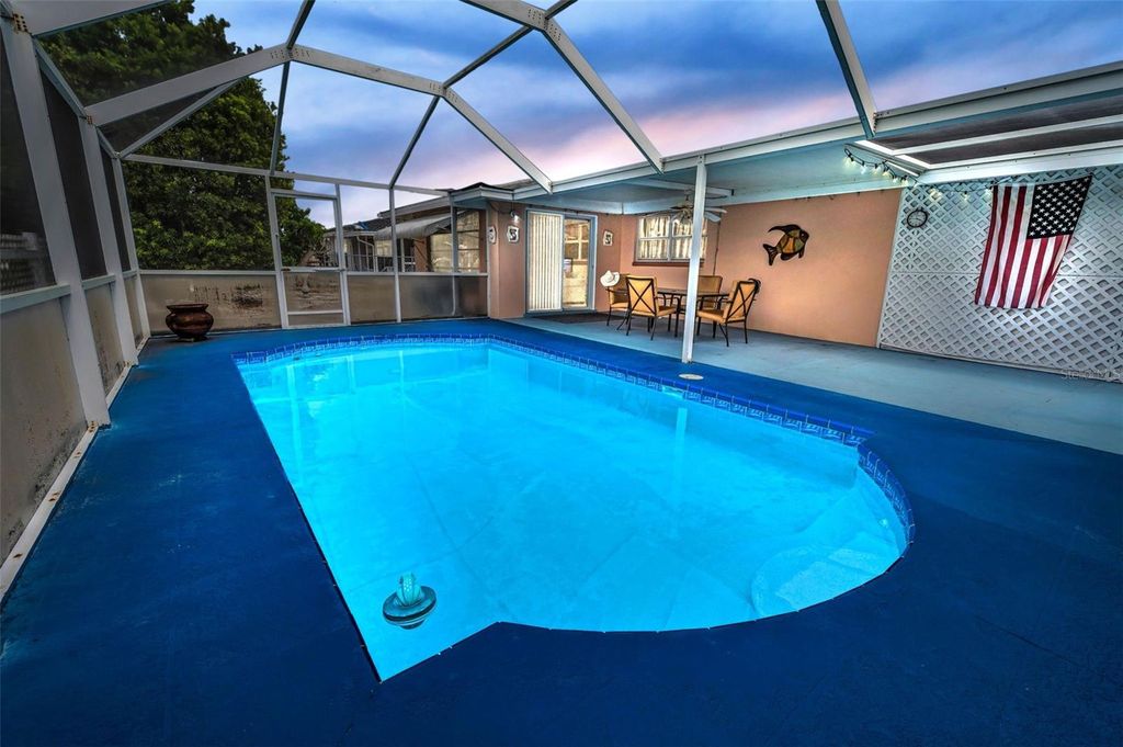 Photo of 7735 Canna Drive, Port Richey, FL 34668 (MLS # W7878054)