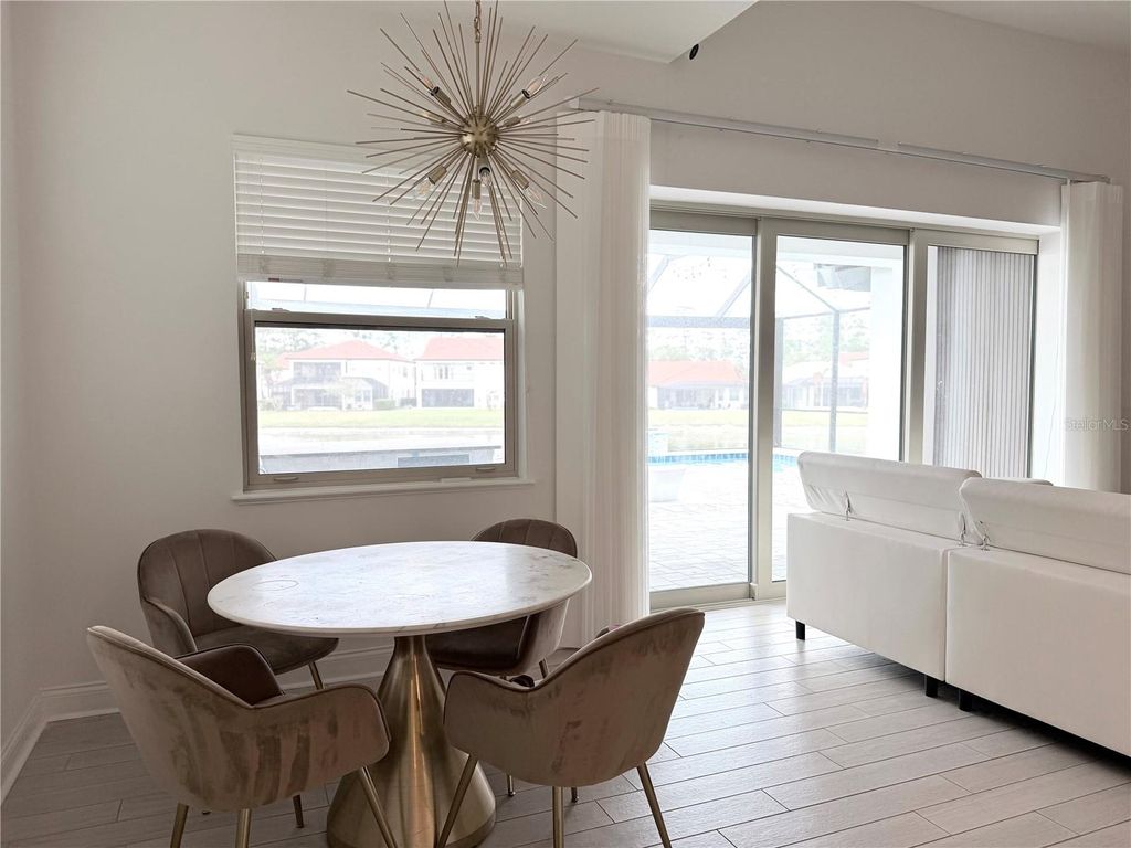 Photo of 10799 Royal Cypress Way, Orlando, FL 32836 (MLS # O6399732)