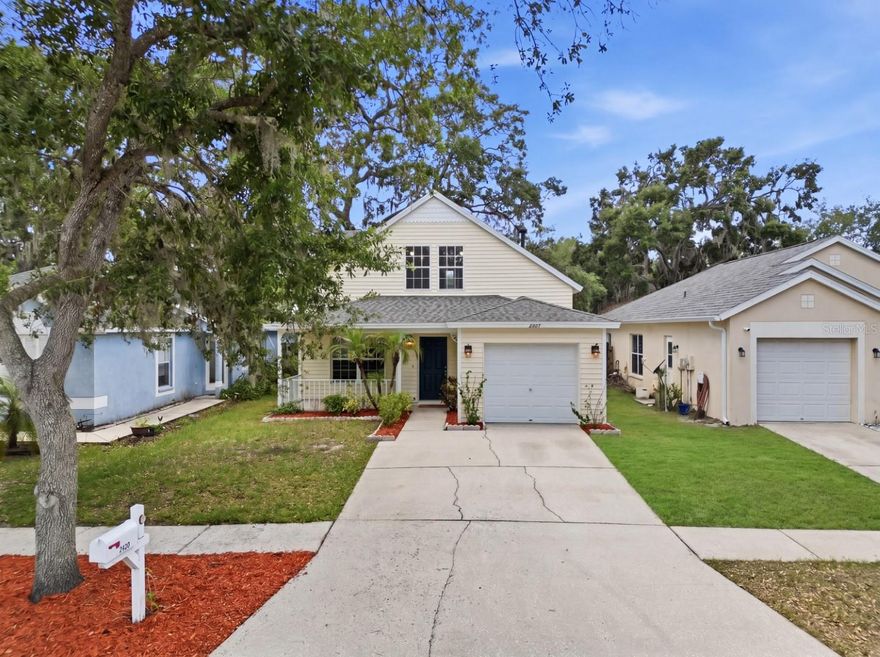 One or more photo(s) has been virtually staged. Welcome to 2629 Golden Antler Lane, where comfort, space, and everyday functionality come together on one of the largest lots in the Deer Park community. The fully fenced, massive backyard offers plenty of room to spread out, relax, and enjoy the outdoors. Whether you're envisioning a future pool, creating an outdoor living space with a firepit, or simply enjoying a more private setting.

An inviting front porch sets a welcoming tone as you arrive. Inside, a thoughtfully designed layout creates a natural flow into the main living areas, where gleaming laminate flooring extends throughout the first floor, enhancing the bright, open feel of the home. The interior has been freshly painted in Sherwin-Williams Superpaint Shoji White (2026), complemented by new 2-inch faux wood blinds (2026) throughout, creating a clean and cohesive backdrop.

The living space transitions seamlessly into the kitchen and breakfast nook, where a charming bay window brings in an abundance of natural light. The kitchen is designed for both functionality and everyday living, featuring white cabinetry, stainless steel appliances, a breakfast bar for casual dining, and a gas range ideal for cooking.

Tucked privately on the first floor, the primary suite offers both convenience and a comfortable retreat, complete with its own bay window, en suite bath, and walk-in closet. Bathrooms throughout the home have been updated with a fresh, modern feel, while ceiling fans and updated window treatments add comfort and consistency throughout.

Upstairs, three additional bedrooms are thoughtfully positioned to provide separation from the main living areas, offering flexibility for a variety of needs. A shared full bathroom completes the second floor and supports the well-balanced layout.

Major updates include a roof replacement (2022) and a new air conditioning system (2025), providing added peace of mind and long-term value.

Ideally located, the home offers convenient access to shopping, dining, and everyday essentials, including Tampa Premium Outlets, The Shops at Wiregrass, and The Grove at Wesley Chapel. Nearby access to the University of South Florida, James A. Haley Veterans Hospital, and other medical facilities adds to the appeal, while quick connections to I-75, I-275, US-41, and the Suncoast Parkway make commuting throughout the Tampa Bay area simple.

With its combination of space, updates, and a location that keeps everything within reach, this home is ready for you to move in and make it your own.