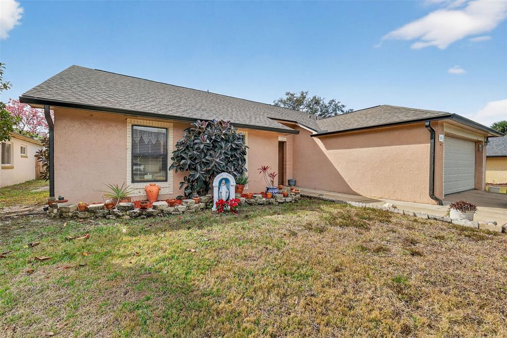 Photo of 562 Hassocks Loop, Lake Mary, FL 32746 (MLS # O6376327)