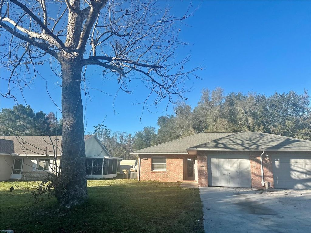 Photo of 2315 Centennial Boulevard, Leesburg, FL 34748 (MLS # G5105862)