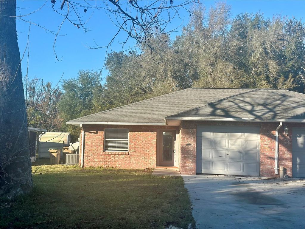 Photo of 2315 Centennial Boulevard, Leesburg, FL 34748 (MLS # G5105862)
