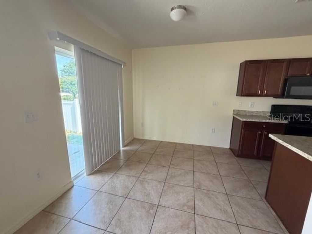 Photo of 117 Tanager Street, Haines City, FL 33844 (MLS # S5150010)