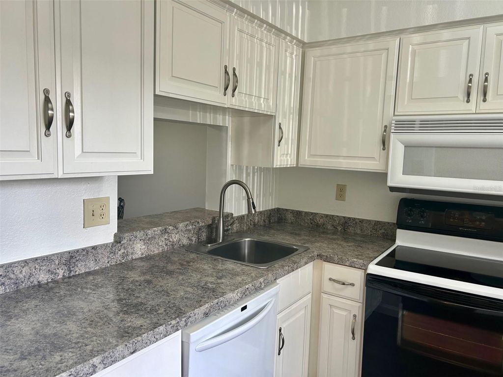 Photo of 1701 Pinehurst Road #18C, Dunedin, FL 34698 (MLS # TB8486083)