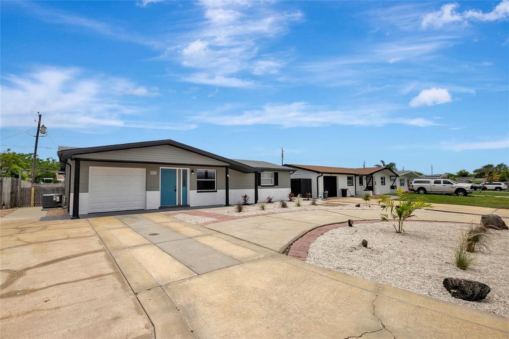 Photo of 4031 Chesswood Drive, Holiday, FL 34691 (MLS # TB8520717)