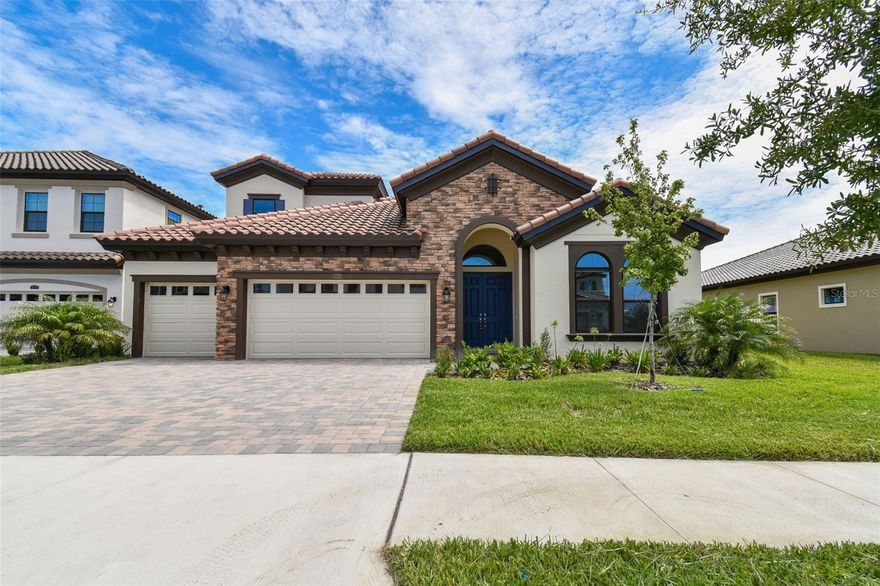 The Biscayne II is a one-story + bonus room and one bed room upstairs, with a wonderful open living floorplan, while providing seclusion for owner’s retreat and secondary bedrooms. The heart of the home is the combined grand room, incredible kitchen and casual dining with access to the outdoor living with its covered lanai. Further, the 12-foot ceilings in the foyer, grand room and kitchen complement the open design. The owner’s retreat features walk-in closets and a luxurious master bath with garden tub and walk-in shower. An upstairs bonus room with bedroom 4 and additional bathroom complete this home. Located in fast-growing Pasco County, Mirada residents enjoy exclusive access to a 15-acre crystalline lagoon—the largest in the nation. Mirada Lagoon connects residents with an amazing beach environment right in their own community to swim, kayak, paddle board and relax. The community’s multi-modal paths conveniently connect neighborhoods to additional amenities like tot lots and dog parks. this house will get refrigerator, washer, and dryer wine cooler in Lanai.