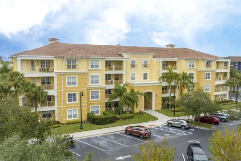 Photo of 5025 Shoreway Loop #10703, Orlando, FL 32819 (MLS # O6348240)