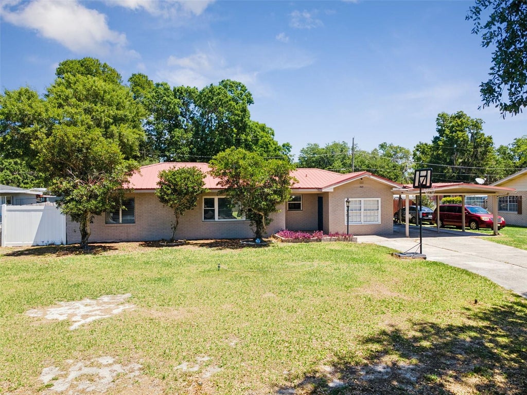 Photo of 303 Granada Road, Auburndale, FL 33823 (MLS # O6442954)