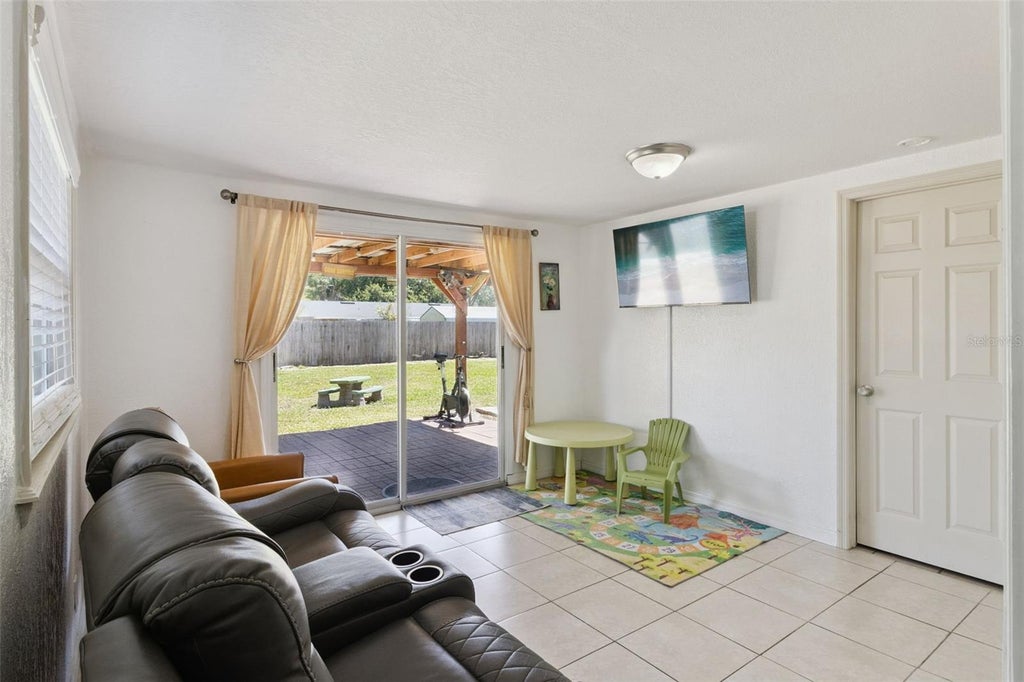 Photo of 303 Granada Road, Auburndale, FL 33823 (MLS # O6442954)