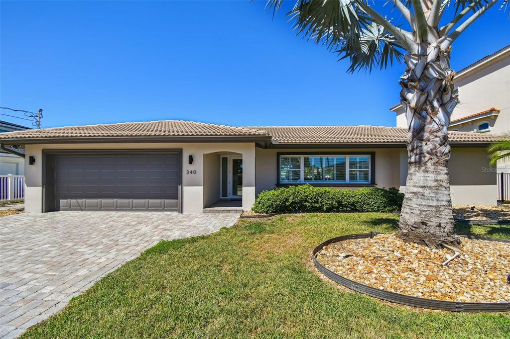 Photo of 340 Palm Island NE, Clearwater Beach, FL 33767 (MLS # TB8438663)
