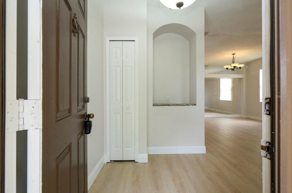Photo of 13827 Hawkeye Drive, Orlando, FL 32837 (MLS # O6449628)