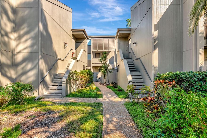 Tucked away in the charming community of Pine Run, this uniquely designed two-story condo offers the perfect blend of privacy, comfort, and Florida lifestyle living in the heart of Osprey. This spacious 2-bedroom, 2-bath residence features a layout offering the primary suite on the first floor—ideal for ease of living and added privacy. The main level offers an inviting living and dining area filled with natural light, creating a warm and welcoming space for both relaxing and entertaining. The primary bedroom retreat provides generous space, ample closet storage, and a well-appointed en-suite bath. Upstairs, you’ll find a loft that is designed to be the second bedroom and full bath, perfect for guests, a home office, or seasonal visitors. The two-story design enhances privacy while maintaining an open and airy feel throughout. Pine Run is truly a hidden gem, known for its lush, mature landscaping and tranquil setting. Residents enjoy a peaceful, maintenance-free lifestyle just minutes from Gulf beaches, waterfront dining, shopping, and the cultural attractions of Sarasota. Whether you’re searching for a full-time residence or a seasonal retreat, this condo offers the ideal combination of comfort, location, and relaxed coastal living.