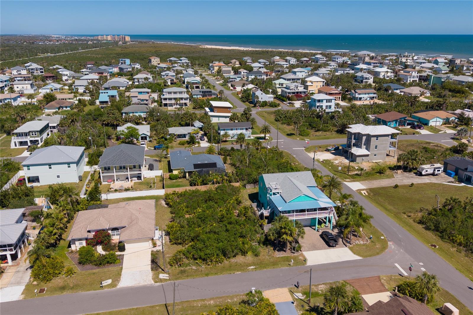Ready to live by the beach? Look no further than this amazing lot on Surf Drive in the sought after beach community of Marineland Acres. Enjoy one of the last uncrowded beaches in Florida. Choose your builder, your design and your timeframe. Bring your boat/RV as there are no restrictions or HOA! Located on the East side of A1A, it's an easy stroll down the quiet roads to a private walkover. Or choose to walk to the new Bay Drive Park which provides a Beach Walkover and Pavillion, bathrooms and showers. Bike to Washington Oaks and explore the intracoastal gardens. Boat ramp at Bings Landing is one mile away. Publix is two miles away. St Augustine is a quick 25 minutes away. I-95 is within 15 minutes for easy access to Daytona, Jax or Orlando. It's the quaint beach life you are looking for, but close to everything you need. A true hidden gem!