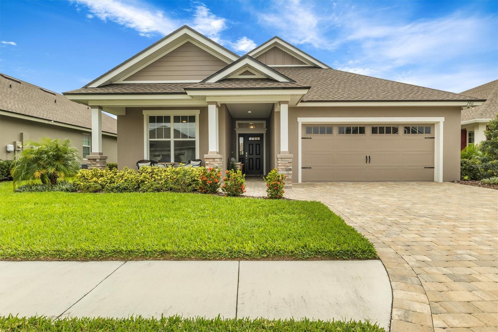 Opportunity knocks in Lake James, one of Central Florida’s most desirable 55 plus communities. Built entirely by Ernie White Construction, Lake James is a serene retreat for those lucky enough to call it home! This is the last new home to be listed in the community. Sure to please the most discriminating buyer, this Gibson IV spec home is waiting for you. Upon arriving you will appreciate the attention to detail, quality of construction, and upgraded materials throughout the home. With three bedrooms and two bathrooms, boasting 1,886 square feet; this open concept, split plan home is sure to capture your interest. The living area of the home is bright, open, and includes the great room, dining room, and kitchen. The kitchen is adorned with Wellborn wood cabinets, an oversized island, and Cambria Quartz solid surface countertops. Keep looking and you will notice the large kitchen pantry, under cabinet lighting, stainless steel appliances, and crown molding throughout the home. Next to the kitchen is the dining area, which leads to the triple glass doors opening the home to the large rear paver patio. Upon making your way to the primary bedroom you will notice the plush carpet in the bedroom and closet. The bedroom easily accommodates a king bedroom set with room to spare. The primary bath features a walk-in shower, dual vanity countertop, dual linen closets, a water closet, and a huge walk-in-closet. The second bedroom, located at the front of the home also features carpet flooring and a walk-in closet. The third bedroom, commonly used as an office features tile flooring. You will appreciate the details you cannot easily see, like the Carrier 15 Seer air conditioner with a 10 YEAR parts and labor warranty, R-38 blown attic insulation (living areas), foam injected insulation in exterior block walls (living areas), Lifetime Dimensional Shingles, and the insulated Low E windows. The appeal of Lake James is obvious. The manicured common areas, the pristine homes, friendly neighbors, and the fact that the HOA provides all yard care, WIFI, and Cable! You will have plenty of time to enjoy the community pool, gym, clubhouse, Bocci ball court, and walking trails! This opportunity will not last long, call today to schedule a private showing!