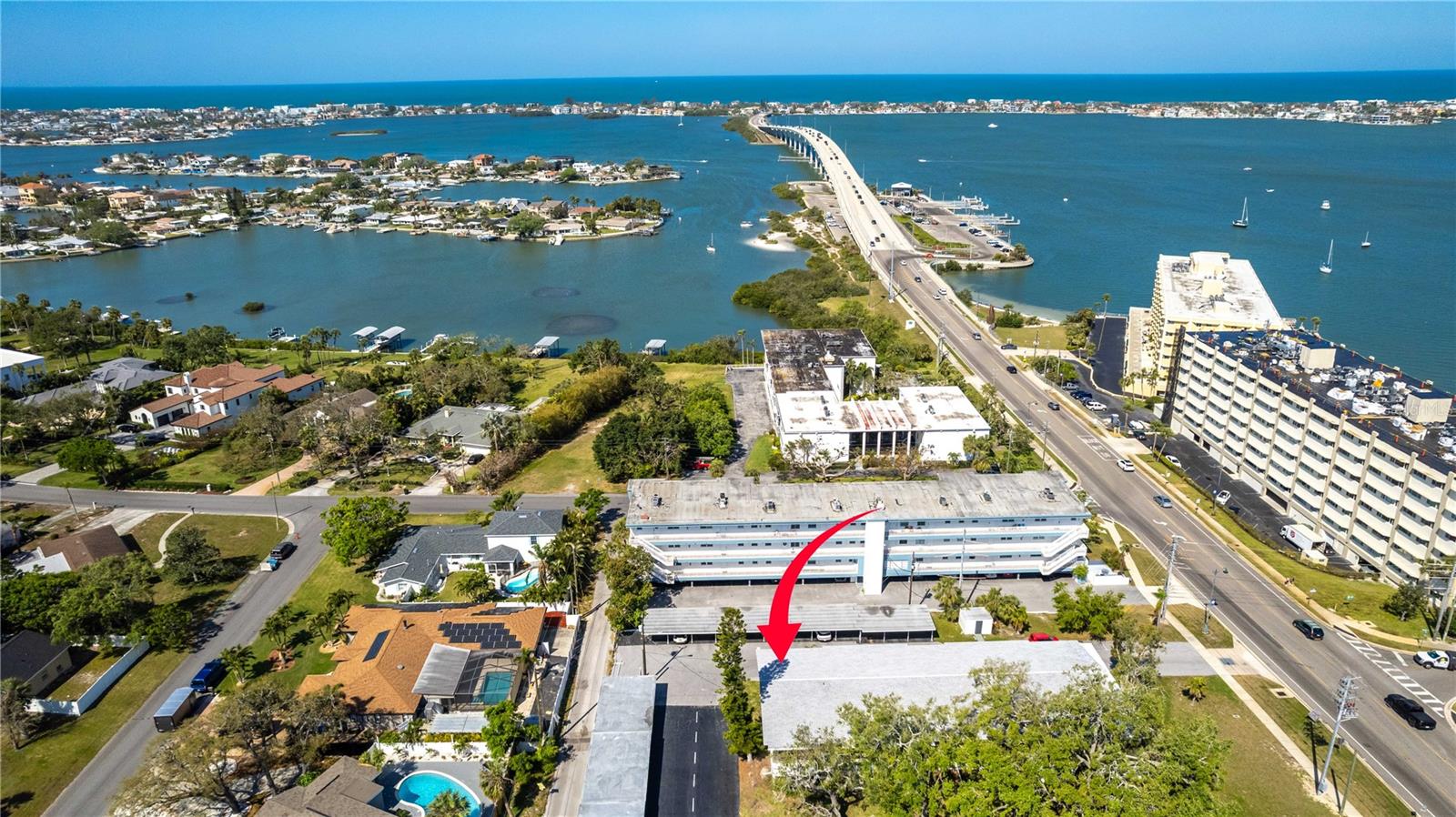 Ideal location in the heart of Belleair Bluffs. This charming, move-in ready condo is almost next door to the iconic Belleair Bridge Marina and Boat Ramps - your gateway to the Gulf and our award-winning beaches. Enjoy easy access to a variety of locally-owned restaurants, coffee shops, boutiques, and nearby golf courses. Whether you're heading out for a sunset cruise or strolling to brunch, this location makes everyday feel like a vacation. Inside, you'll find a thoughtfully updated interior with warm character. The updated kitchen features brand-new appliances, new countertops, new tile flooring, led lighting, wood cabinetry and a closet pantry for added storage. The bathroom is also tastefully updated. Enjoy views of the beautifully landscaped courtyard shaded by mature oaks, and convenient access to the shared laundry room on the same floor. Additional features include a designated covered parking spot, 2020 water heater, low HOA fees, and a pet-friendly policy allowing two cats. No flood insurance required and a 3 month minimum rental policy. Whether you are looking for a full-time residence, a vacation escape, or a smart investment, this condo checks all the boxes. Don't miss your chance to own a piece of paradise in Belleair Bluffs.