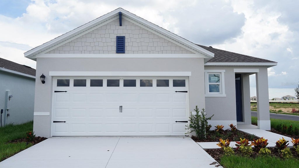 Photo of 5576 Taverna Loop, Winter Haven, FL 33884 (MLS # O6423863)