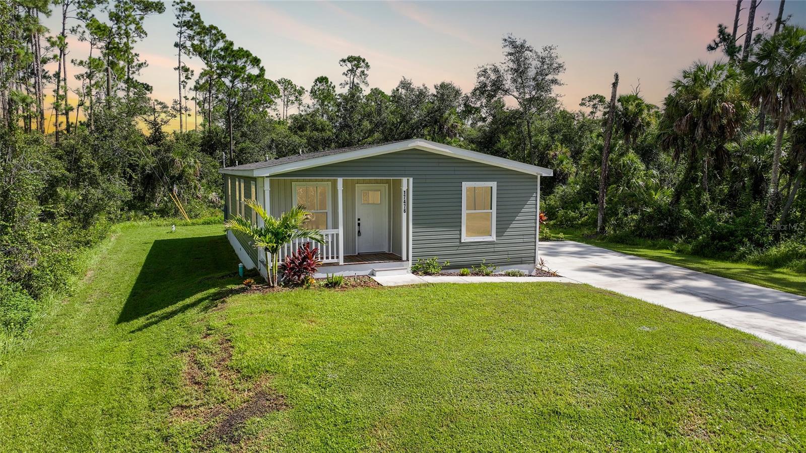 Limited time - 4.99% Interest Rate with the use of preferred lender. Cute as a button!!! This brand new home not is NOT in a flood zone and also comes with hurricane shutters. The kitchen is a chef's dream as it comes with all top of the line stainless steel appliances and has a large center island for extra counter space. You will love entertaining in this home as the kitchen overlooks a large great room and there is also a seperate dining room extra seating. If you don't need a dining room then turn it into office space, the possibilities are endless. Down the hall is a lovely primary bedroom with an en suite bath that features dual sinks, seperate shower and gorgeous luxury vinyl flooring. There is plenty of room for guests as this home also has 2 guest bedrooms and a lovely guest bathroom. The location of this home is perfect too. It is close to route 41 and I-75 for easy commuting. There are restaurants, shopping, golf courses and beaches near by and this home is also not far from the Rays and Braves spring training complex. You can easily travel down to Punta Gorda's cute down town or drive 30 minutes to beautiful Boca Grande. Make this cute as a button home yours today. It truly is a gem. Be sure to see the 3D tour that is attached to this listing.